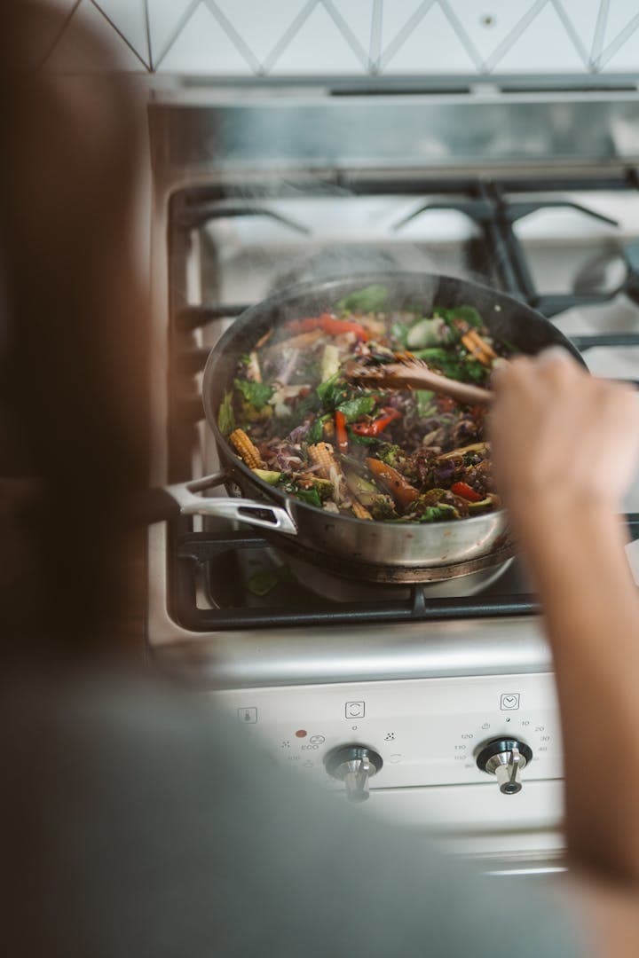 Cooking in a black pan